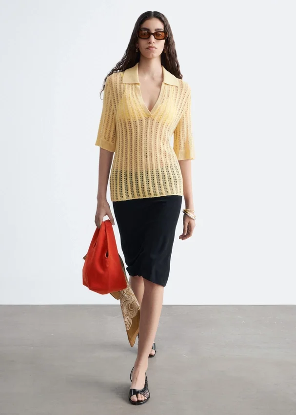 Polo-Shirt aus offenem Strick Polo-Shirt aus offenem Strick
