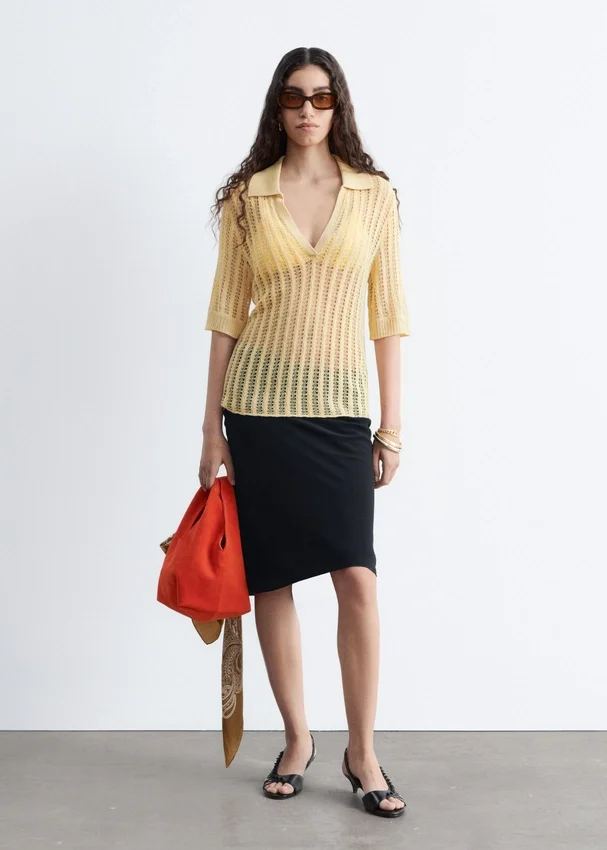 Polo-Shirt aus offenem Strick Polo-Shirt aus offenem Strick