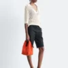 Polo-Shirt aus offenem Strick Polo-Shirt aus offenem Strick