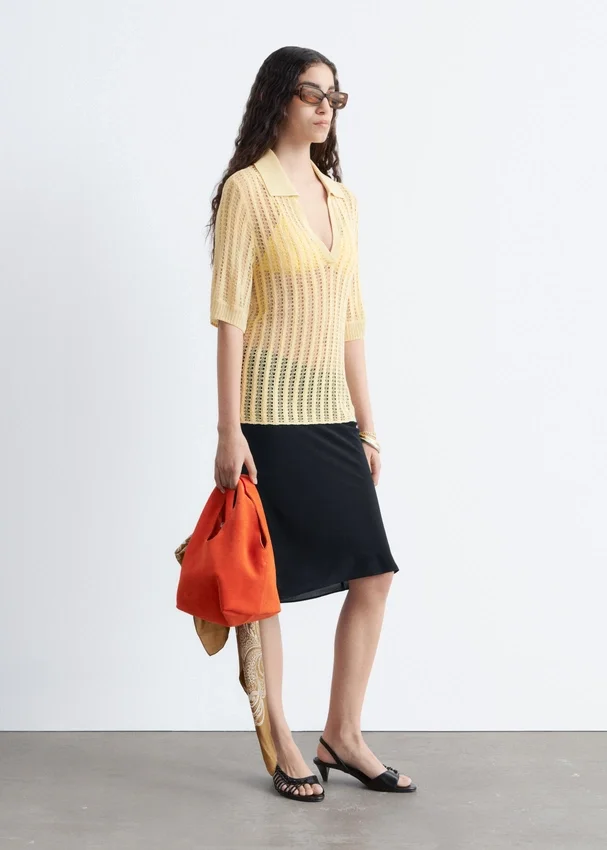 Polo-Shirt aus offenem Strick Polo-Shirt aus offenem Strick