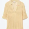 Polo-Shirt aus offenem Strick Polo-Shirt aus offenem Strick