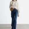 Press-Crease-Jeans mit ausgestelltem Bein Press-Crease-Jeans mit ausgestelltem Bein