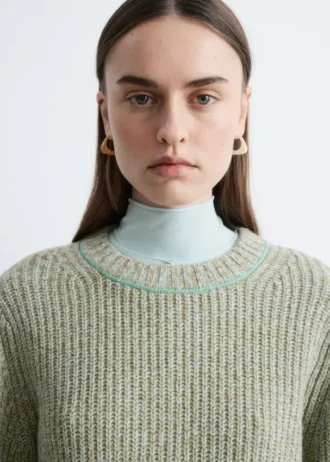 Pullover aus Merinowolle mit Akzentstichen Pullover aus Merinowolle mit Akzentstichen