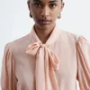 Seiden-Bluse mit Krawattenkragen Seiden-Bluse mit Krawattenkragen