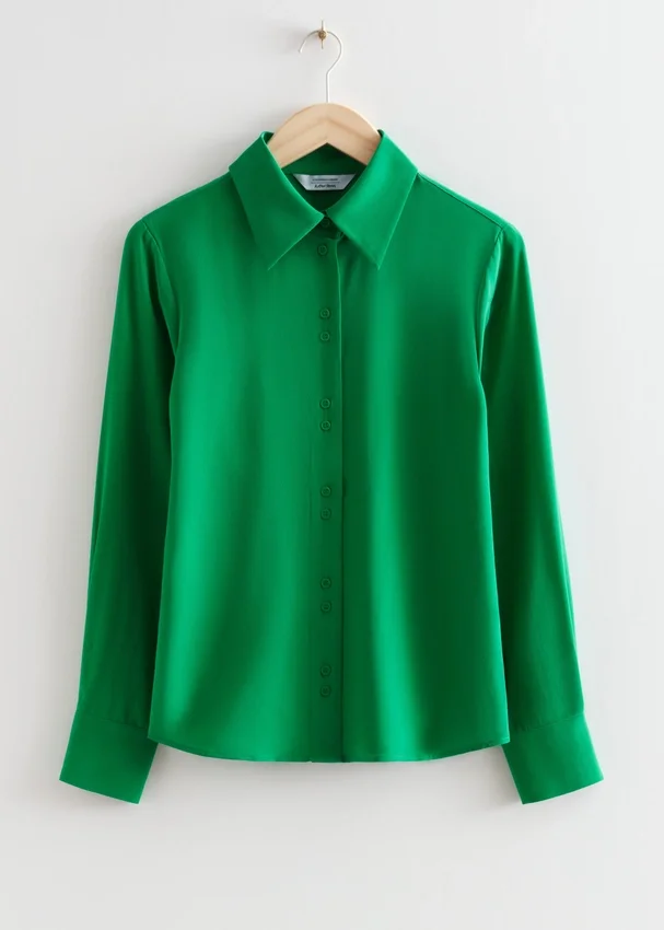 Seiden-Bluse mit Muschelknöpfen Seiden-Bluse mit Muschelknöpfen