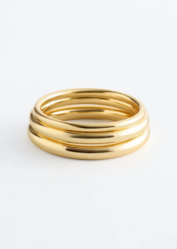 Set aus röhrenförmigen Armreifen Set aus röhrenförmigen Armreifen
