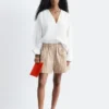 Skulpturale Baumwoll-V-Ausschnitt-Bluse Skulpturale Baumwoll-V-Ausschnitt-Bluse
