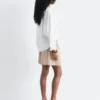 Skulpturale Baumwoll-V-Ausschnitt-Bluse Skulpturale Baumwoll-V-Ausschnitt-Bluse