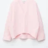 Skulpturale Baumwoll-V-Ausschnitt-Bluse Skulpturale Baumwoll-V-Ausschnitt-Bluse