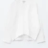 Skulpturale Baumwoll-V-Ausschnitt-Bluse Skulpturale Baumwoll-V-Ausschnitt-Bluse