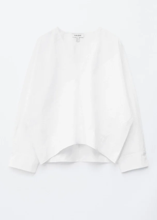 Skulpturale Baumwoll-V-Ausschnitt-Bluse Skulpturale Baumwoll-V-Ausschnitt-Bluse