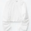 Skulpturale Bluse mit Kordelzug Skulpturale Bluse mit Kordelzug