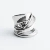 Skulpturaler Doppelwickelring Skulpturaler Doppelwickelring