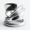 Skulpturaler Doppelwickelring Skulpturaler Doppelwickelring