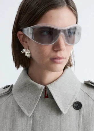 Sonnenbrille mit markantem ovalem Rahmen
