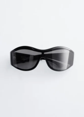 Sonnenbrille mit markantem ovalem Rahmen