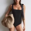 Strandkleid mit strukturierter Schleife Strandkleid mit strukturierter Schleife