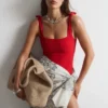 Strandkleid mit strukturierter Schleife Strandkleid mit strukturierter Schleife