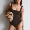Strandkleid mit strukturierter Schleife Strandkleid mit strukturierter Schleife