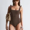 Strandkleid mit strukturierter Schleife Strandkleid mit strukturierter Schleife