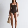 Strandkleid mit strukturierter Schleife Strandkleid mit strukturierter Schleife