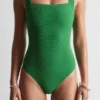 Strandkleid mit strukturierter Schleife Strandkleid mit strukturierter Schleife
