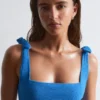 Strandkleid mit strukturierter Schleife Strandkleid mit strukturierter Schleife