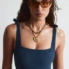 Strandkleid mit strukturierter Schleife Strandkleid mit strukturierter Schleife