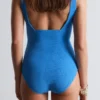 Strandkleid mit strukturierter Schleife Strandkleid mit strukturierter Schleife