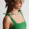 Strandkleid mit strukturierter Schleife Strandkleid mit strukturierter Schleife