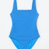 Strandkleid mit strukturierter Schleife Strandkleid mit strukturierter Schleife