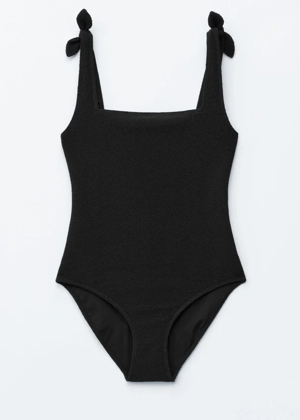 Strandkleid mit strukturierter Schleife Strandkleid mit strukturierter Schleife