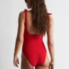 Strandkleid mit strukturierter Schleife Strandkleid mit strukturierter Schleife