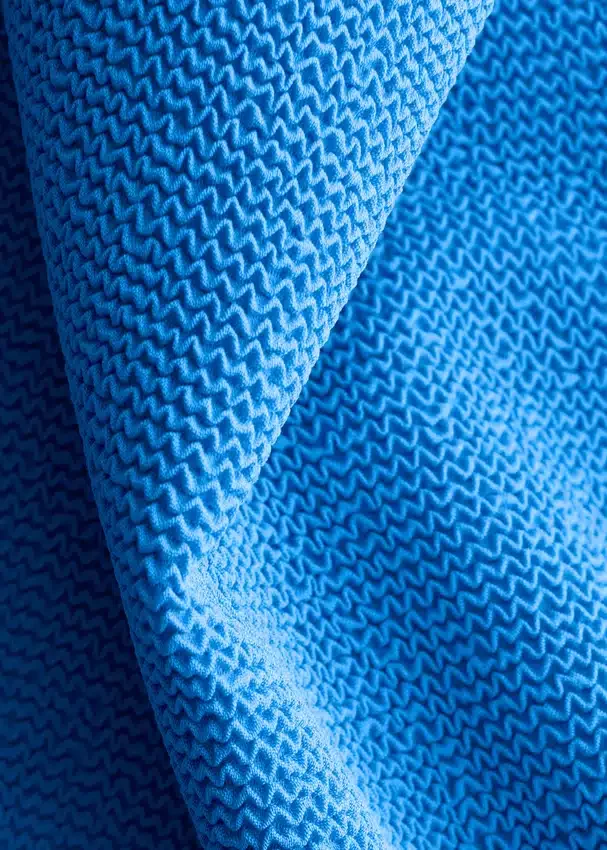 Strandkleid mit strukturierter Schleife Strandkleid mit strukturierter Schleife