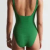 Strandkleid mit strukturierter Schleife Strandkleid mit strukturierter Schleife