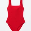 Strandkleid mit strukturierter Schleife Strandkleid mit strukturierter Schleife