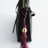 Taschenanhänger aus Leder mit Quaste