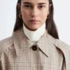 Trenchcoat mit kariertem Muster und Schnallengürtel Trenchcoat mit kariertem Muster und Schnallengürtel