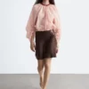 Voluminöse Bluse mit Bindedetails Voluminöse Bluse mit Bindedetails