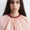Voluminöse Bluse mit Bindedetails Voluminöse Bluse mit Bindedetails