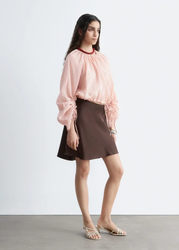 Voluminöse Bluse mit Bindedetails Voluminöse Bluse mit Bindedetails