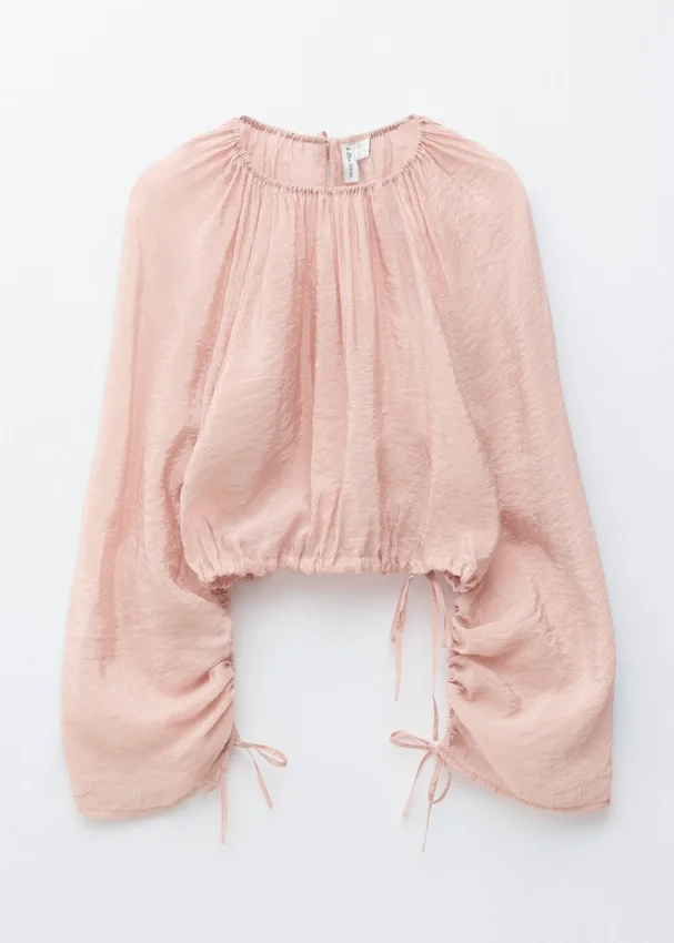 Voluminöse Bluse mit Bindedetails Voluminöse Bluse mit Bindedetails